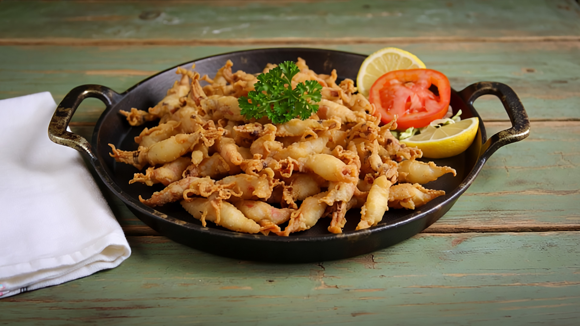 Puntillitas fritas sind frittierte Babytintenfische und zählen zu den beliebten Vorspeisen der kanarischen Küche.